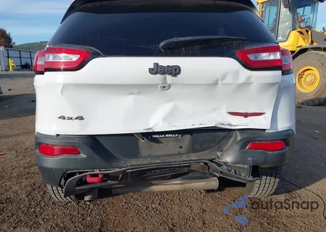 2015 Jeep Cherokee Trailhawk from USA, damaged, VIN 1C4PJMBB2FW770174